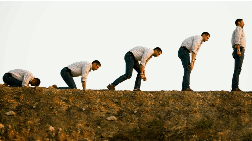 Sequence of a man standing up from a crouching position