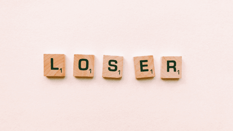 Scrabble tiles spelling loser, representing the inner dialogue of asking, am I a loser.