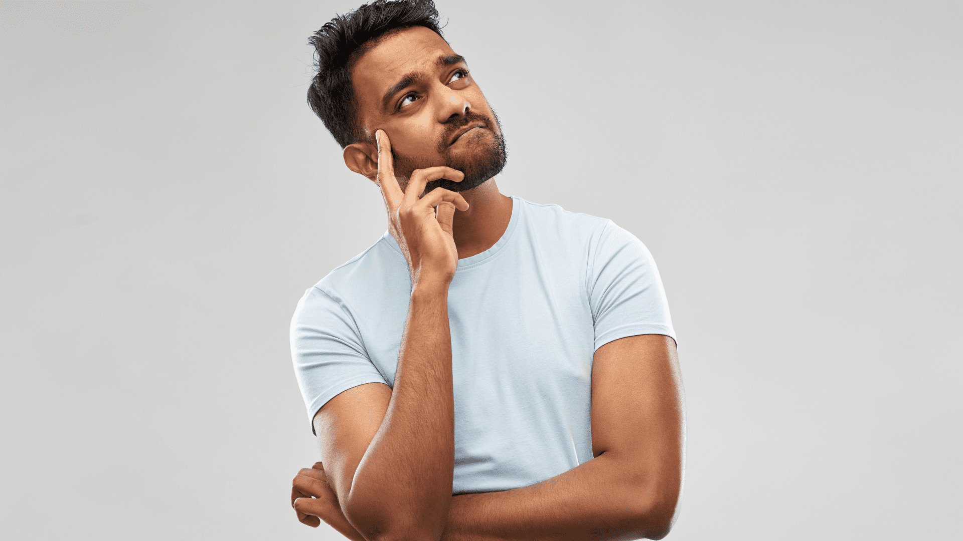 Man contemplating neuroscience coach vs therapist decision for mental health support