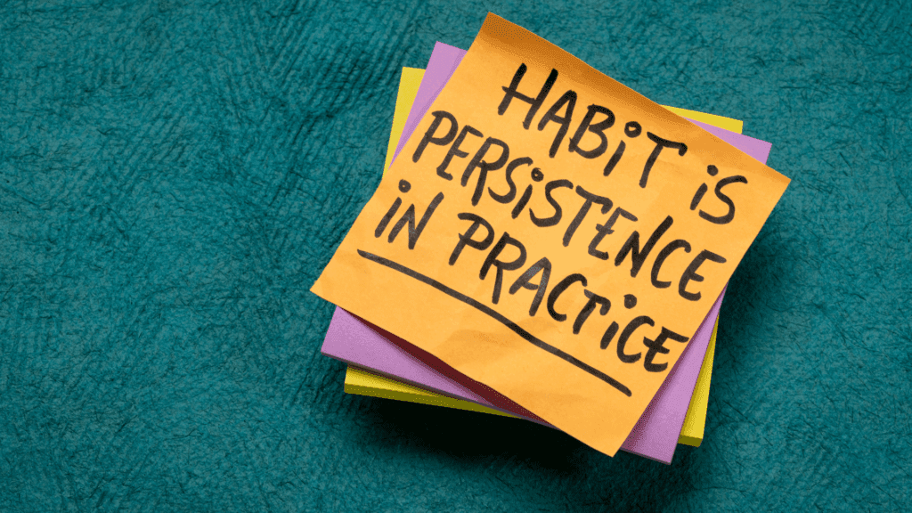 Sticky note saying “Habit Is Persistence In Practice,” symbolizing routines that reduce sexual compulsivity.
