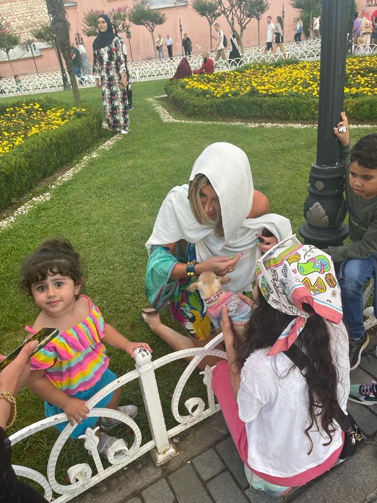 Dr. Sydney Ceruto connecting with children in Turkey showing authentic joy
